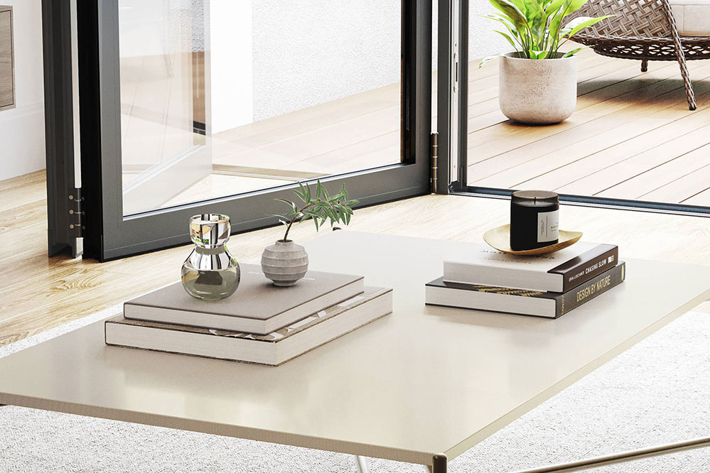 Aluminium bi-fold doors opening around a corner on a home extension