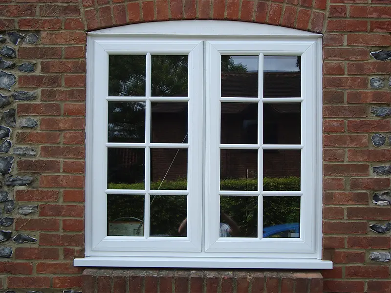 Decorative casement window fitted on a period-style home