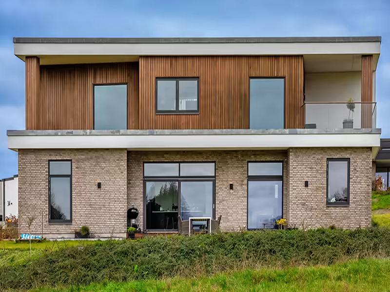 Aluminium-clad tilt and turn windows installed on a modern Kent home