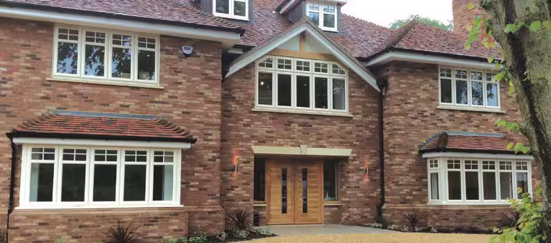 Traditional-looking uPVC legacy profile window with period-inspired detailing