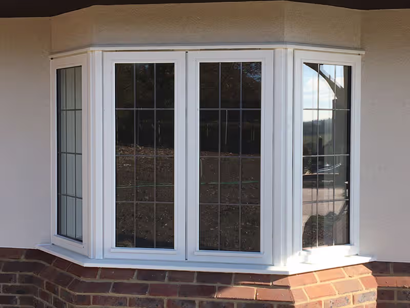 Completed timber storm bay window installation on a UK home
