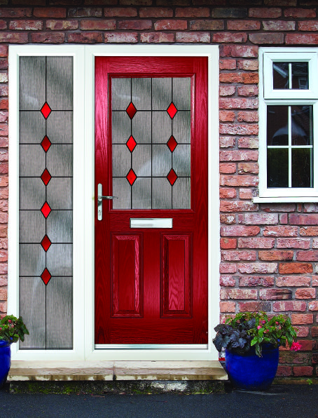 Decorative transom glazing set within an insulated white bay window