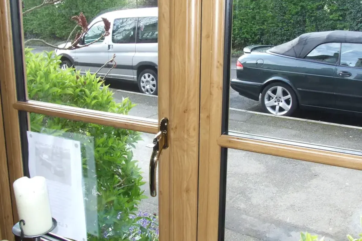 Close-up of reinforced window locking components for home security