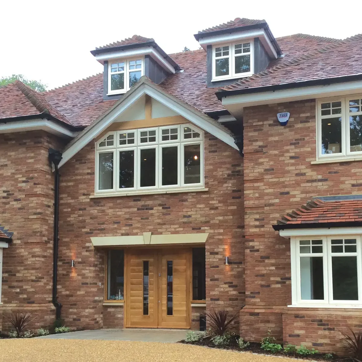 White uPVC double glazed windows installed on a family home