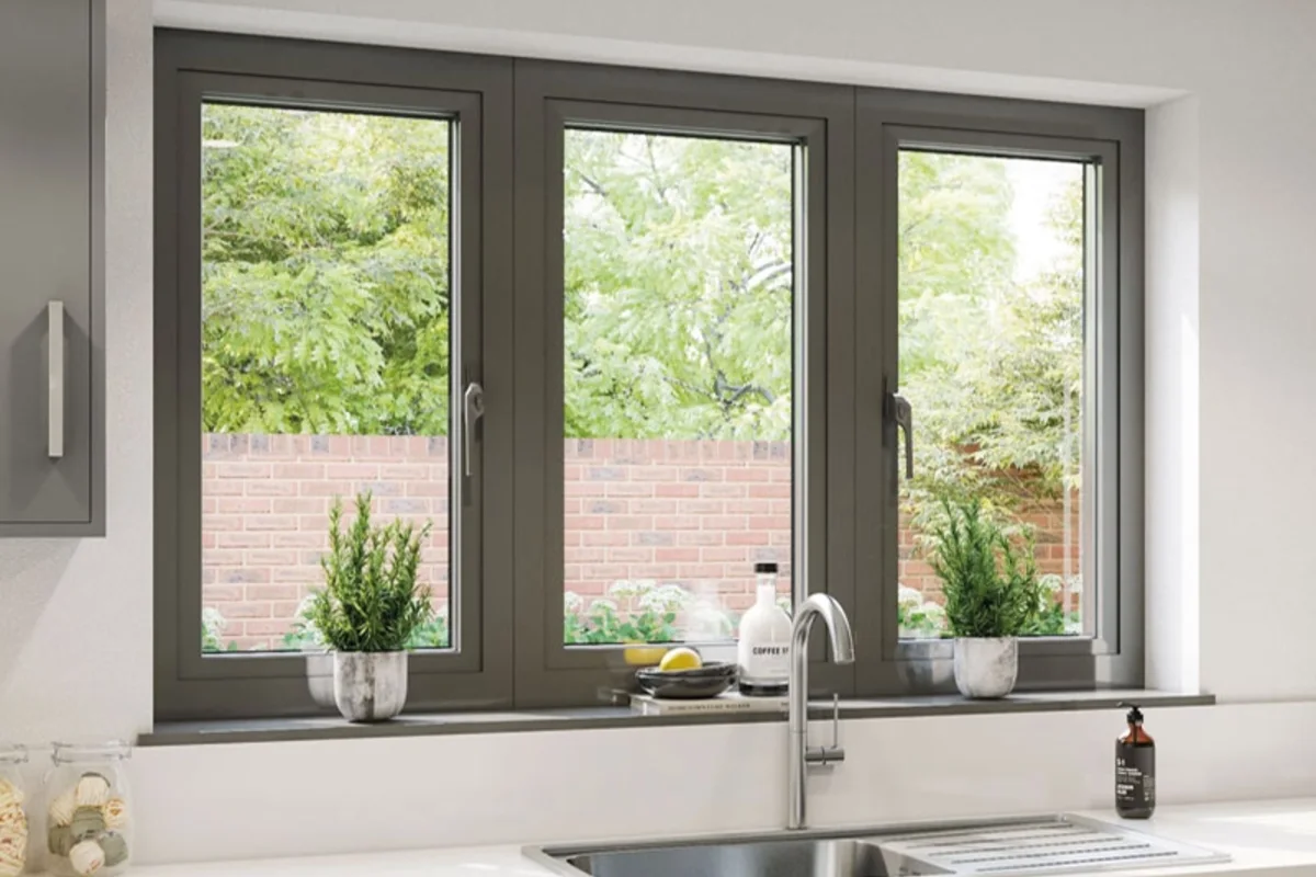 Bright kitchen with high-performance glazing fitted for thermal comfort