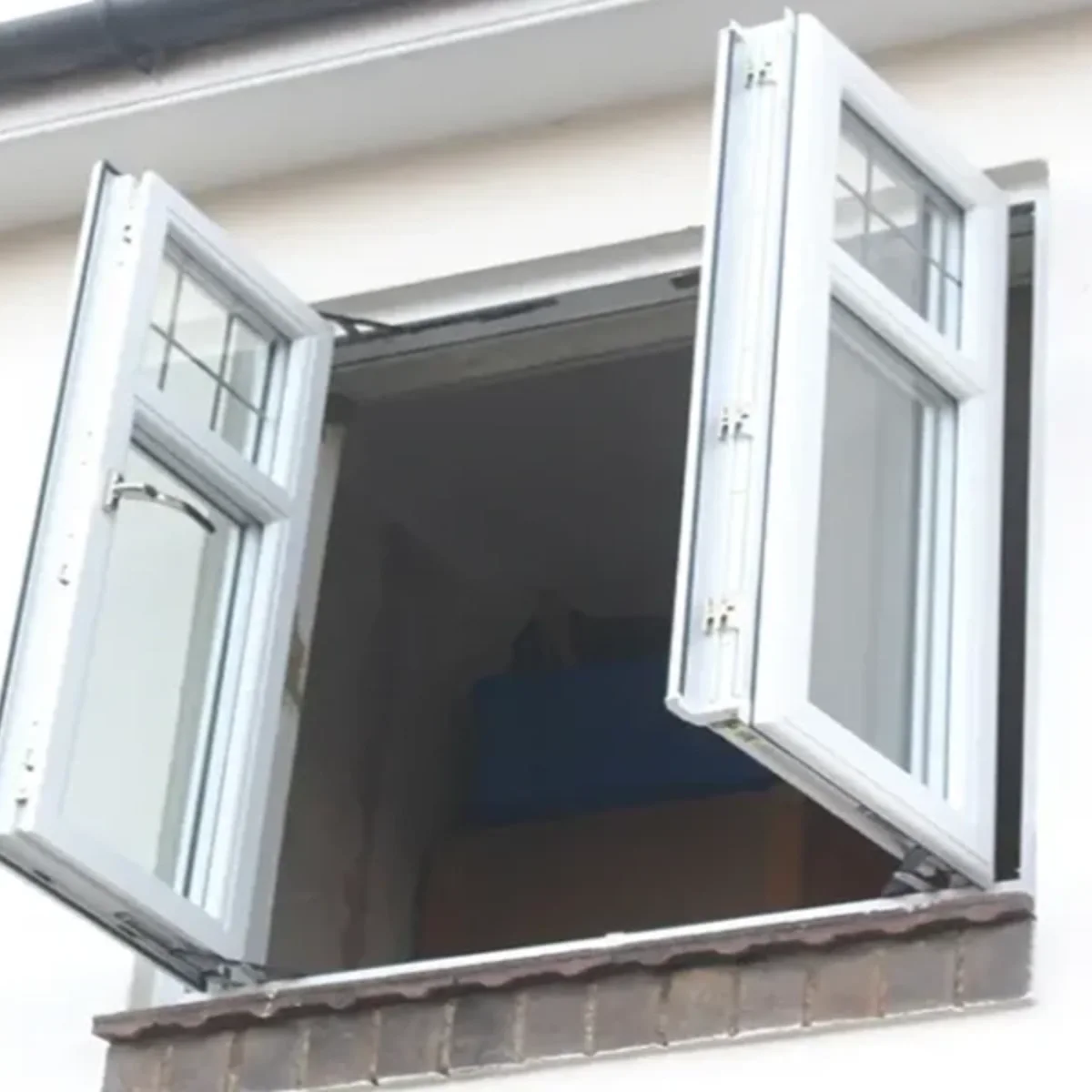 French-style double glazed window opened inward for ventilation