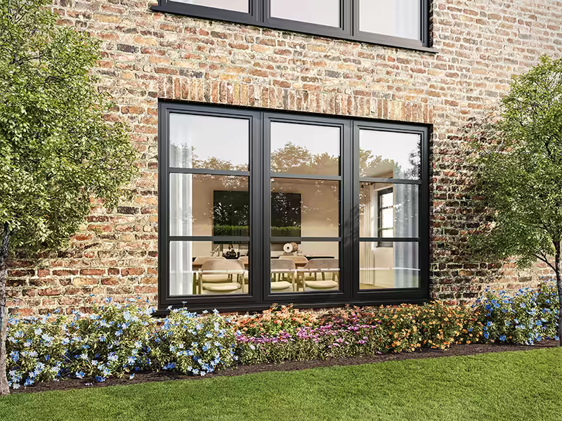 Heritage aluminium window installed in a brick wall